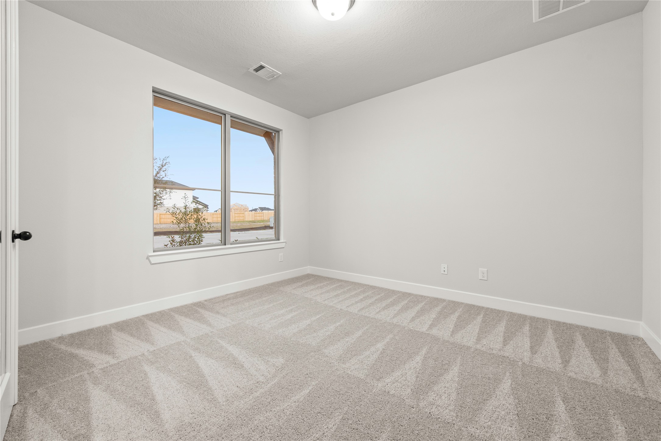 638 Walnut Br Drive Rosenberg, TX 77471 - Photo 13 of 27 an empty room with windows