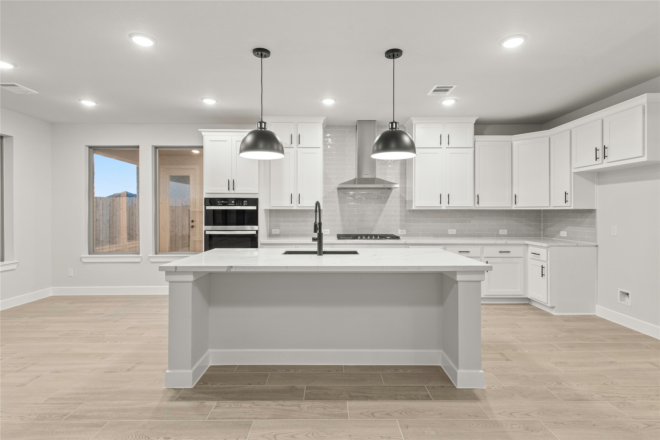 638 Walnut Br Drive Rosenberg, TX 77471 - Photo 5 of 27 a large kitchen with cabinets
