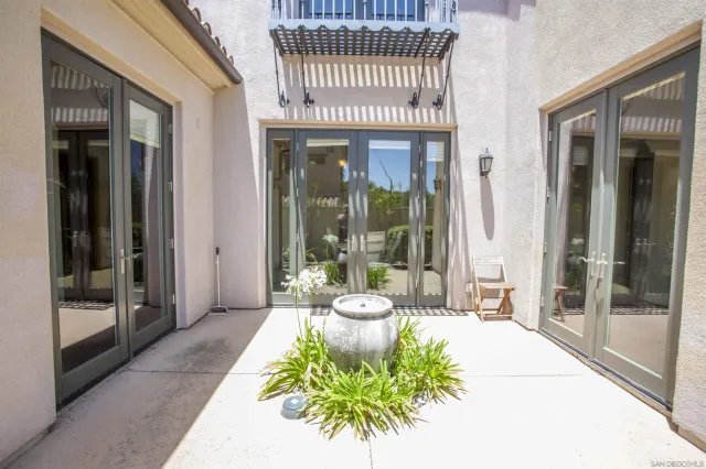 a view of a chairs and table in the terrace