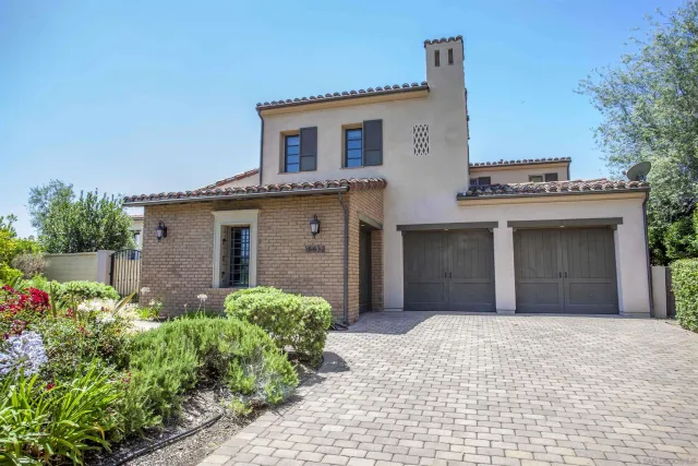 a view of a kitchen with sink dryer and washer