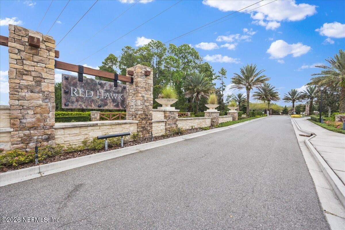 2393 Reese Way Jacksonville, FL 32246 - Photo 20 of 30 a view of a street with a building in the background
