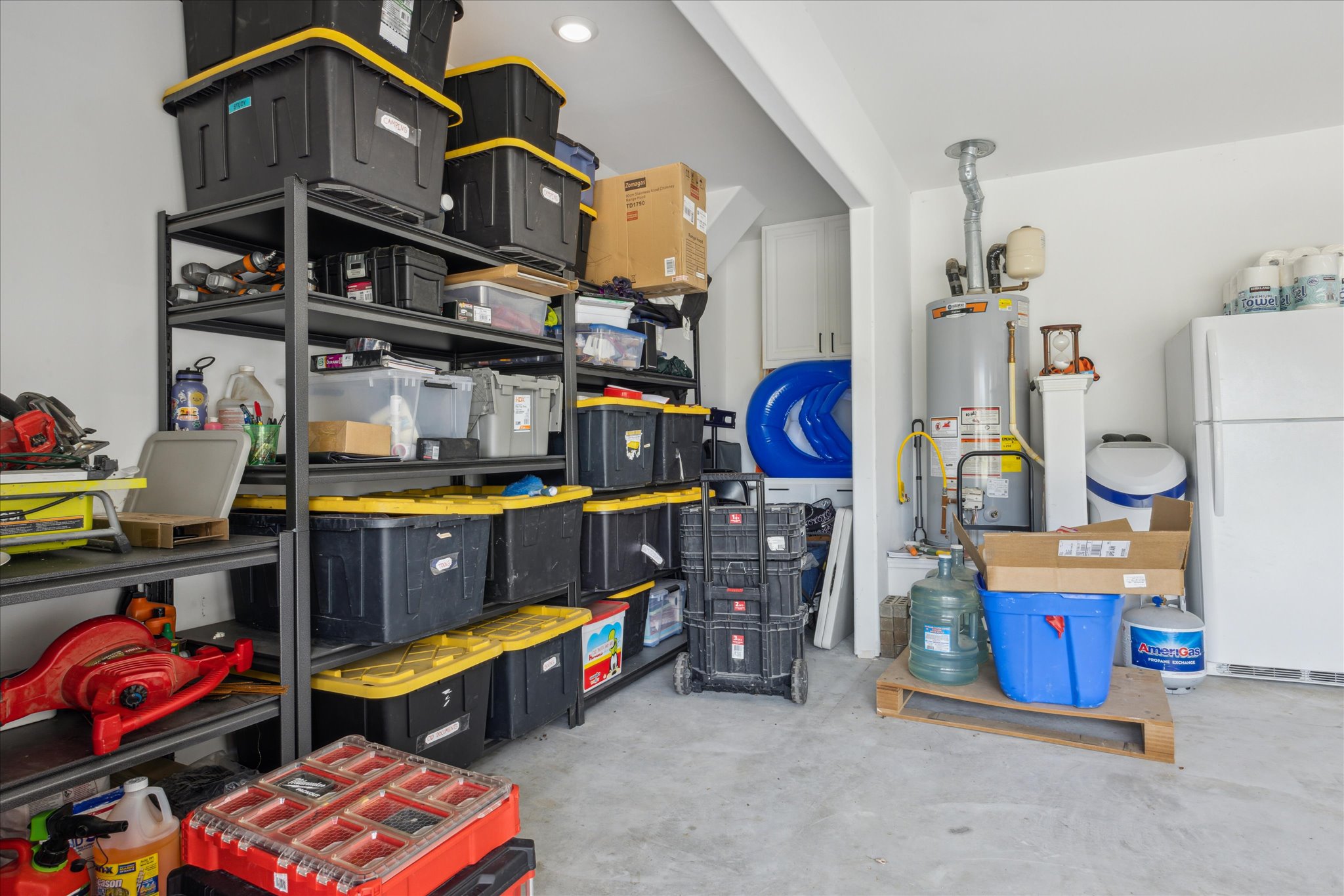 700 Legends Lane Georgetown, TX 78628 - Photo 24 of 31 Storage with gas water heater