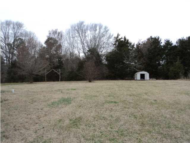 1916 Kimbell Road Terry, MS 39170 - Photo 4 of 14 A view of the spacious 2 acres and shed.