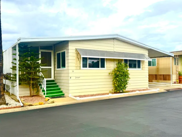 a view of a house with a balcony