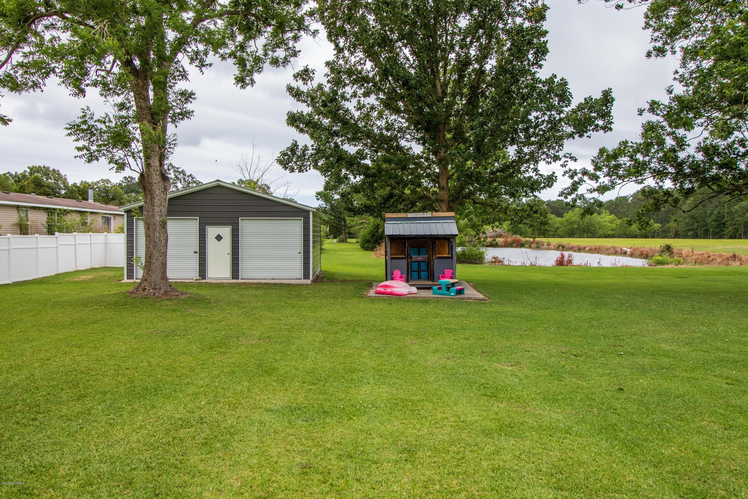 1263 Nine Foot Road Newport, NC 28570 - Photo 39 of 43 Backyard & Storage Building