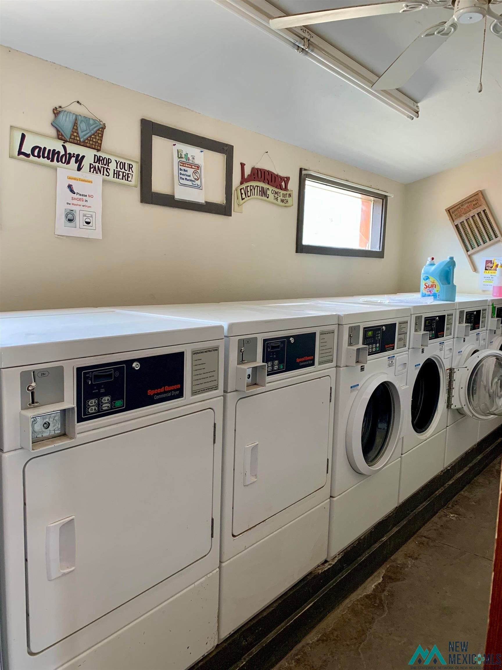 371 Candy Kitchen Road Candy Kitchen, NM 87357 - Photo 11 of 49 Dedicated laundry facility featuring multiple commercial-grade washer and dryer units