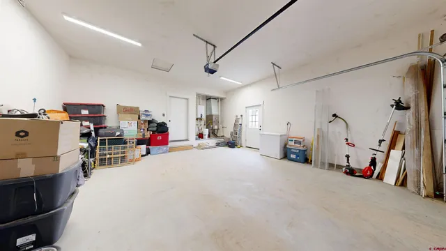 a room with furniture and a flat screen tv