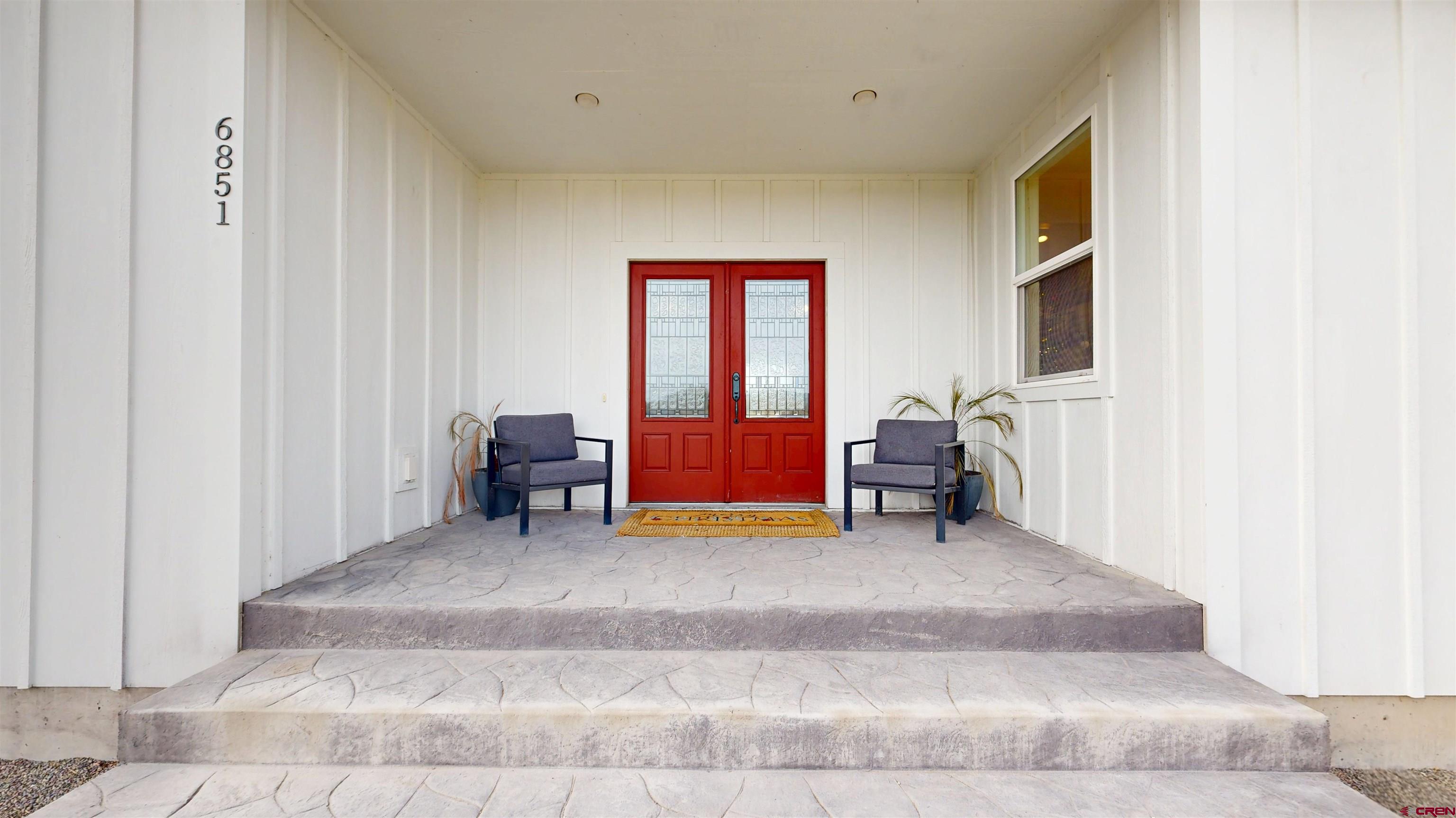 6851 Church Road Olathe, CO 81425 - Photo 3 of 27 a living room with furniture and a large window