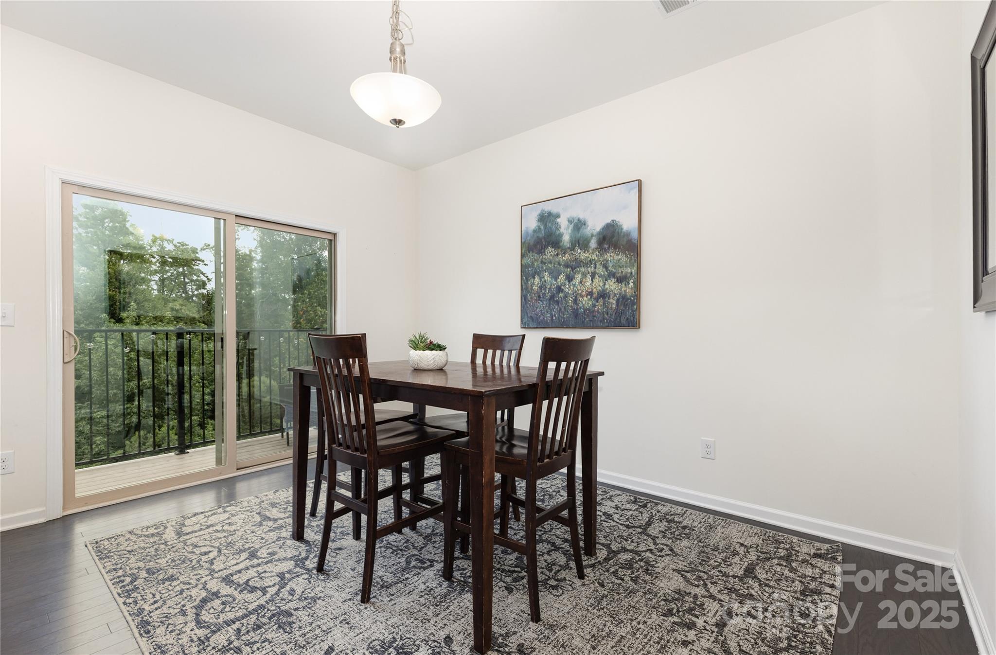 717 Swift Run Tega Cay, SC 29708 - Photo 11 of 39 a view of a dining room with furniture window and outside view