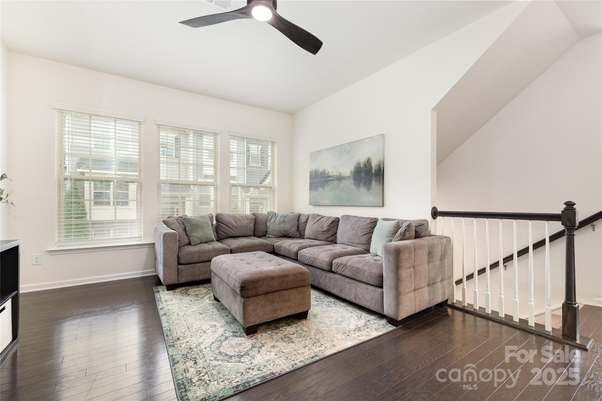 717 Swift Run Tega Cay, SC 29708 - Photo 3 of 39 a living room with furniture and a window