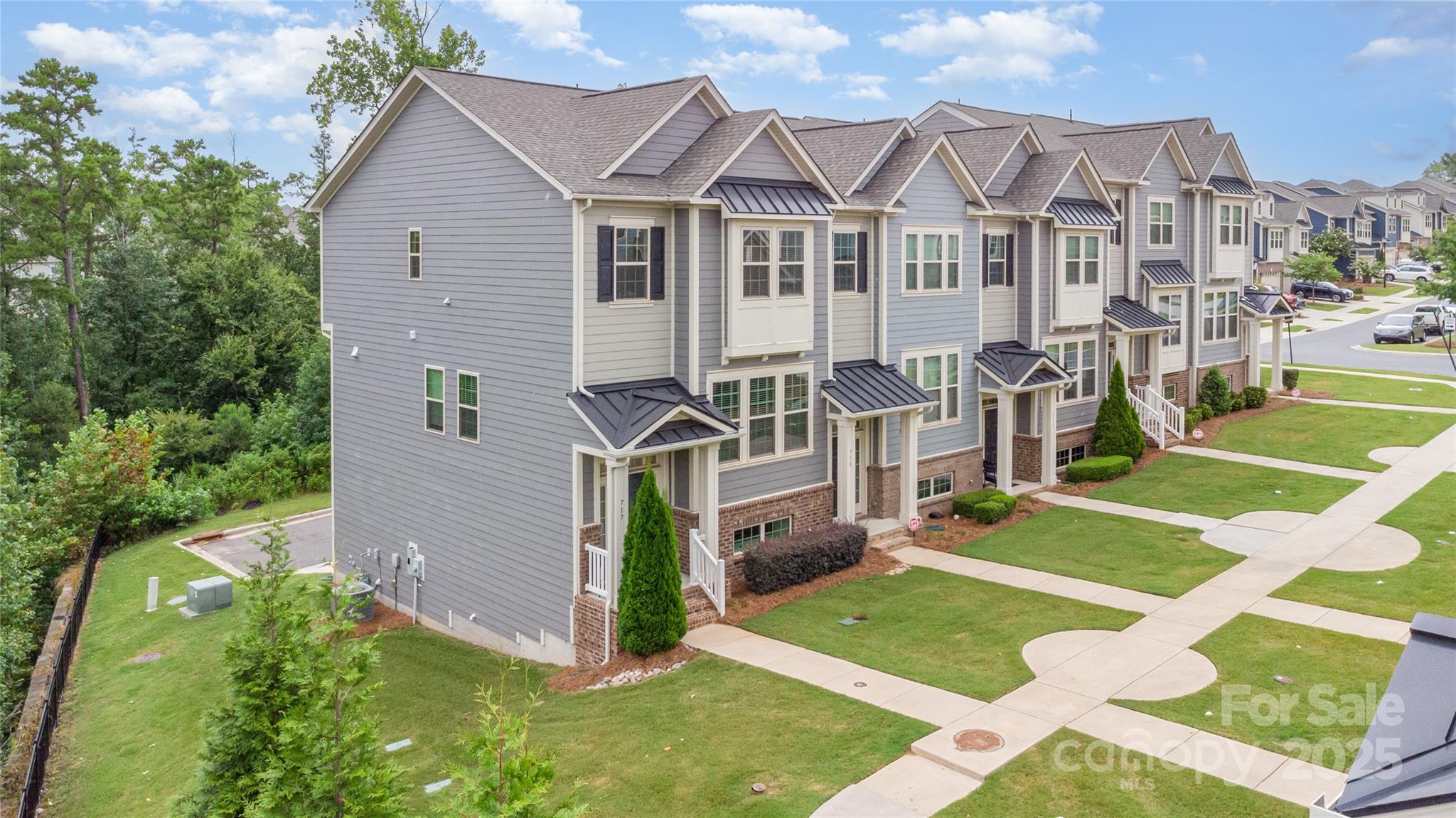717 Swift Run Tega Cay, SC 29708 - Photo 33 of 39 a view of a house with a yard