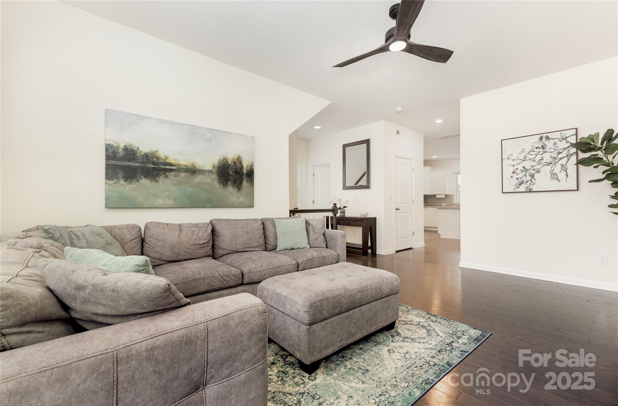 717 Swift Run Tega Cay, SC 29708 - Photo 5 of 39 a living room with furniture and a rug