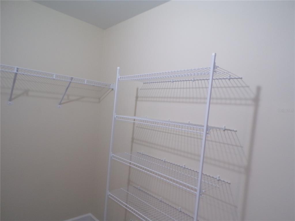 3112 Pinetree Street Port Charlotte, FL 33952 - Photo 14 of 35 a view of a walk in closet
