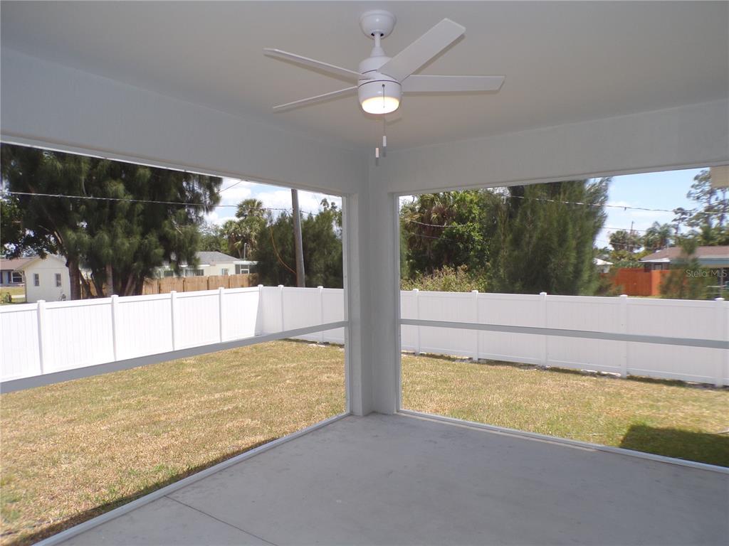 3112 Pinetree Street Port Charlotte, FL 33952 - Photo 31 of 35 a view of an empty room with a large window
