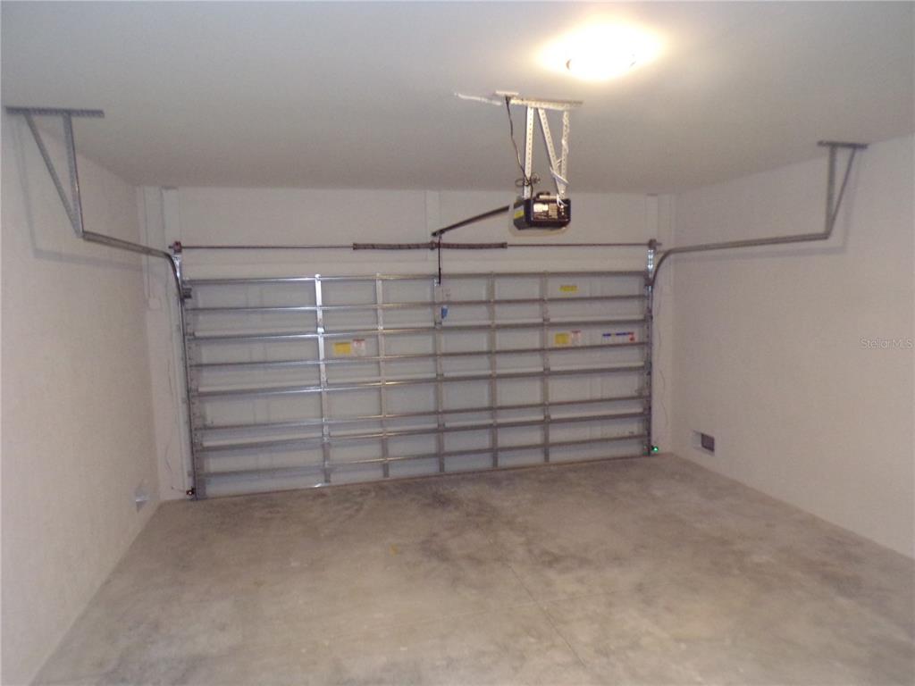 3112 Pinetree Street Port Charlotte, FL 33952 - Photo 33 of 35 a view of a store room with cabinets