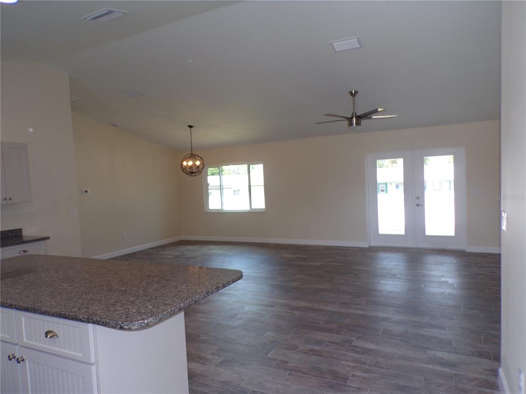 3112 Pinetree Street Port Charlotte, FL 33952 - Photo 5 of 35 a view of an empty room and window
