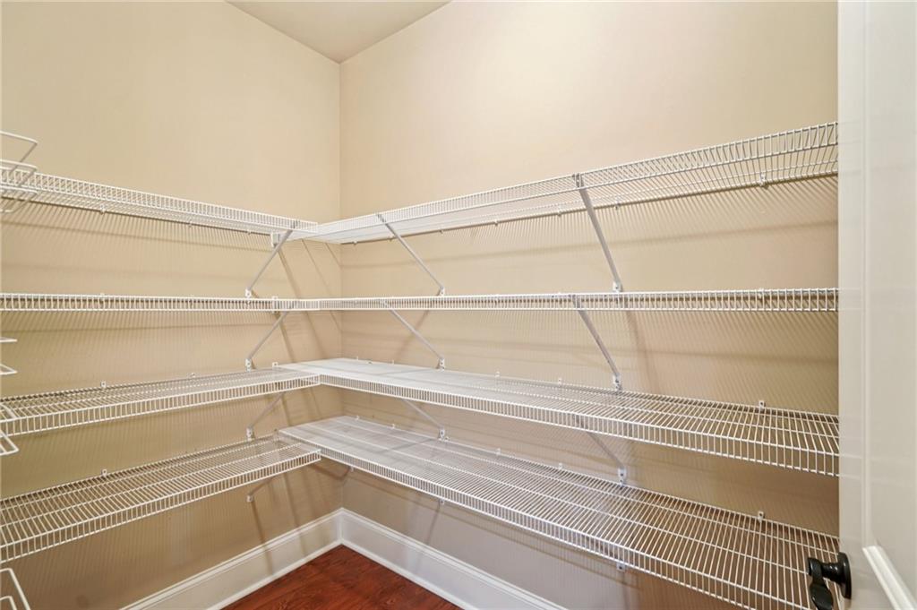 488 Townsend Street Grayson, GA 30017 - Photo 14 of 40 a view of a room with racks on the wall