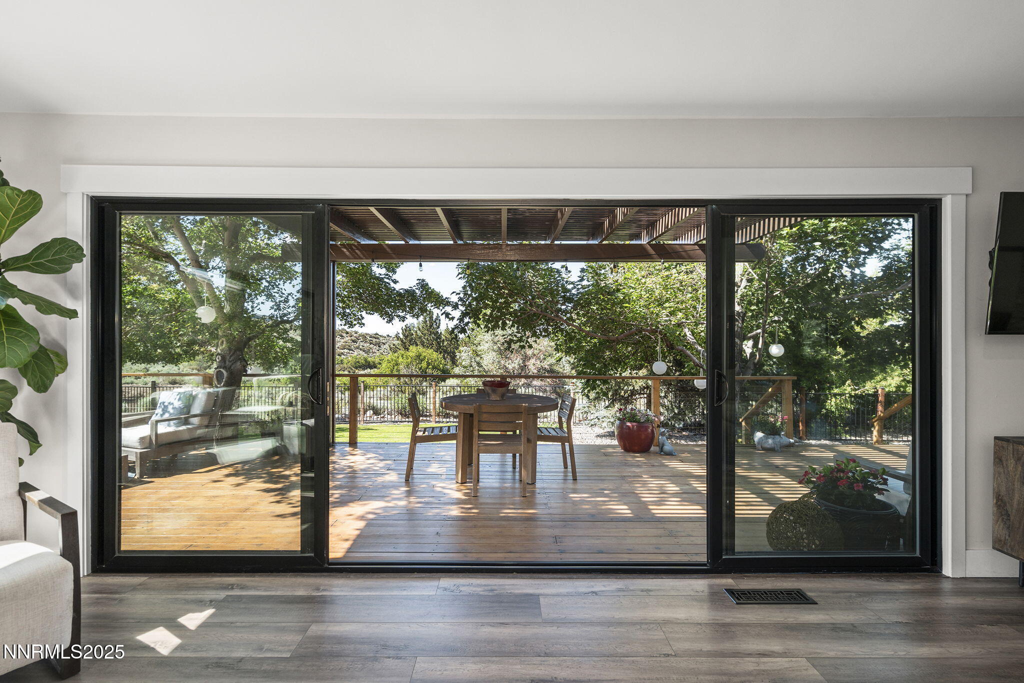 a living room with large windows