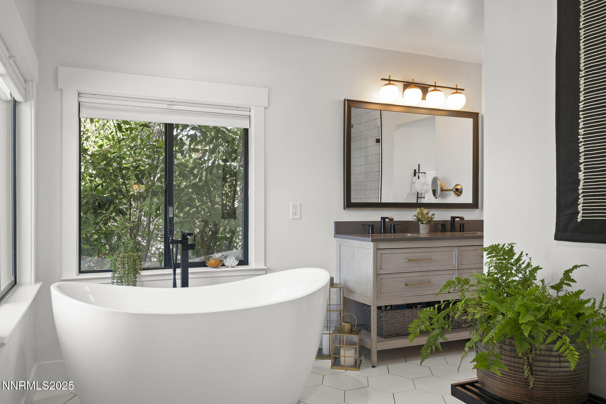 2505 Trails End Lane Reno, NV 89511 - Photo 16 of 45 a white bath tub sitting in a bathroom