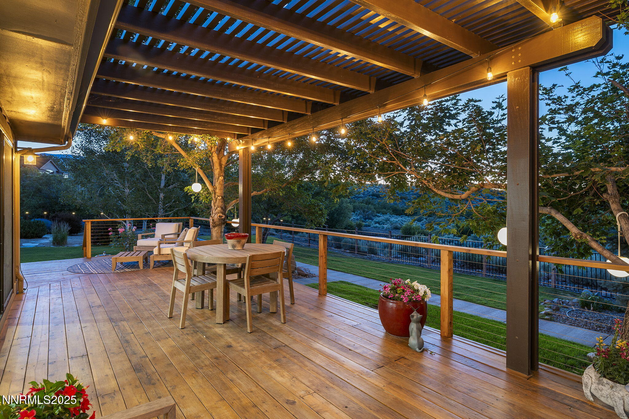 2505 Trails End Lane Reno, NV 89511 - Photo 27 of 45 a view of a deck with wooden floor and outdoor seating