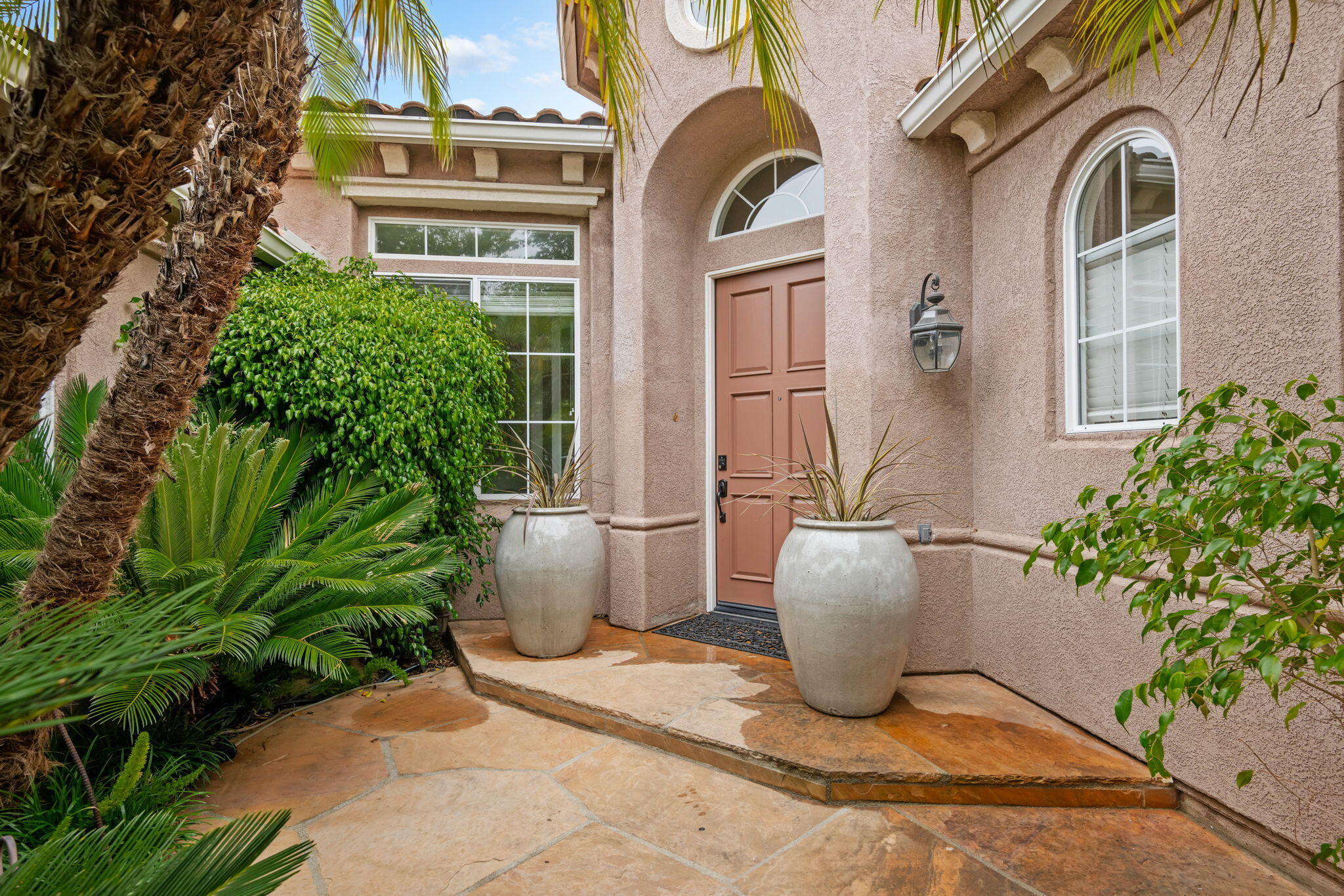 252 King Daniel Lane Goleta, CA 93117 - Photo 2 of 42 a view of a building with potted plants
