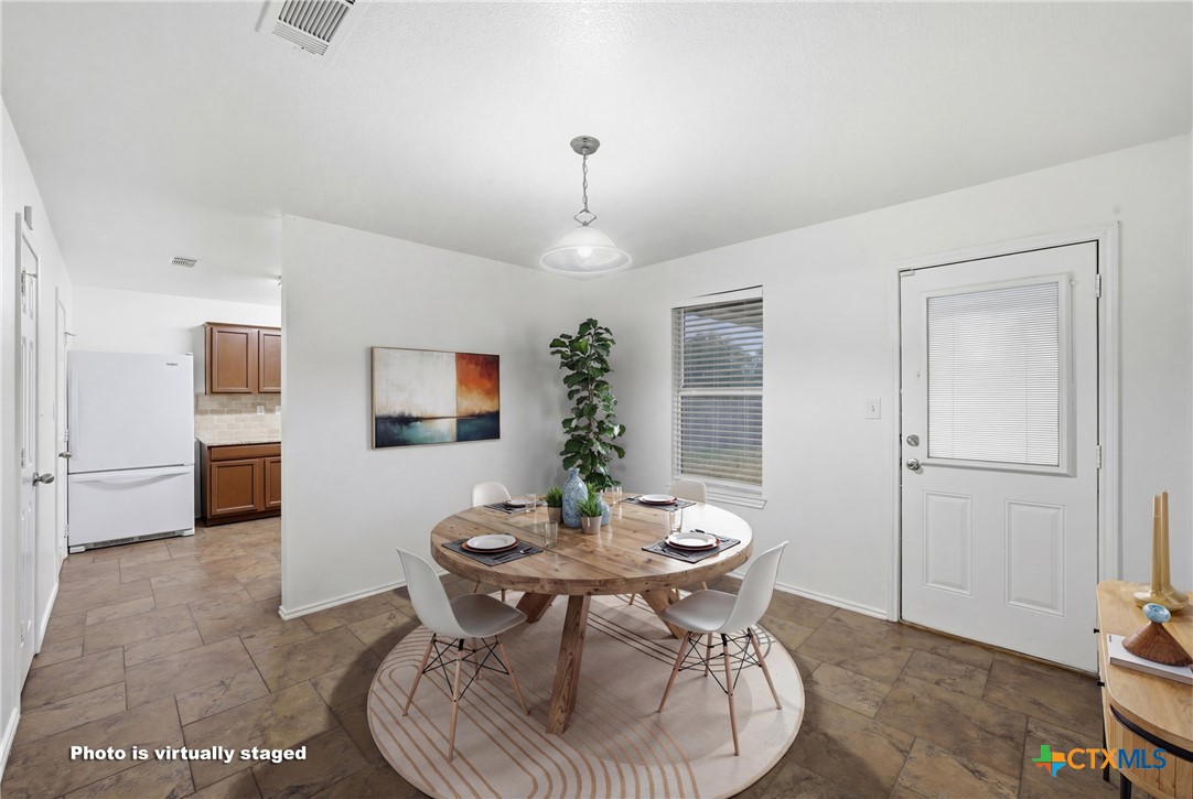 6525 Brooks Drive Temple, TX 76502 - Photo 12 of 37 a view of a dining room with furniture