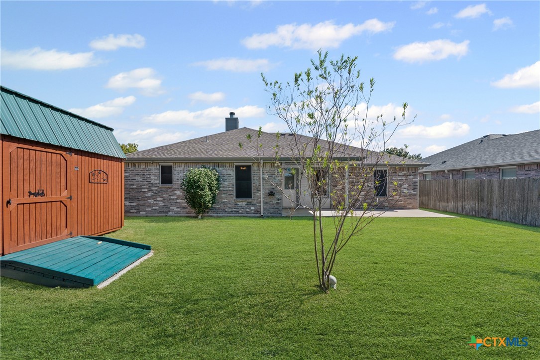 6525 Brooks Drive Temple, TX 76502 - Photo 3 of 37 a view of a backyard with a garden