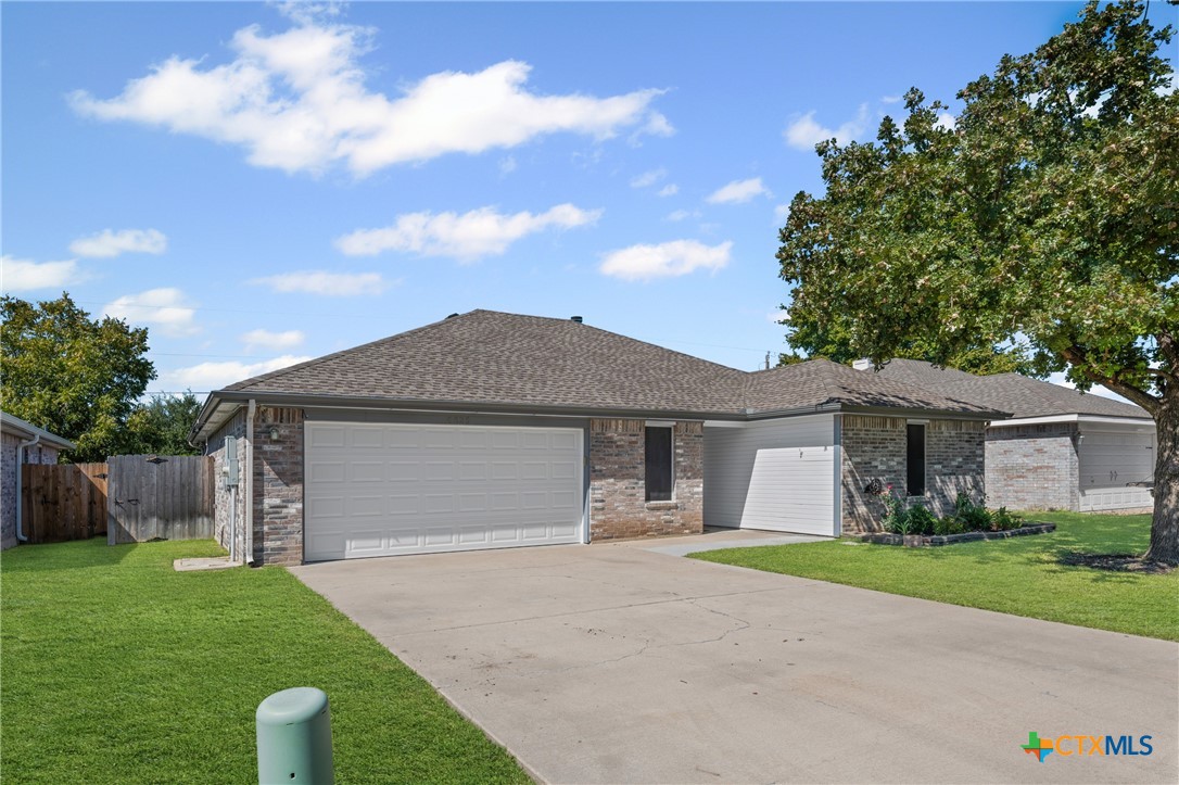 6525 Brooks Drive Temple, TX 76502 - Photo 36 of 37 a front view of house with yard and green space