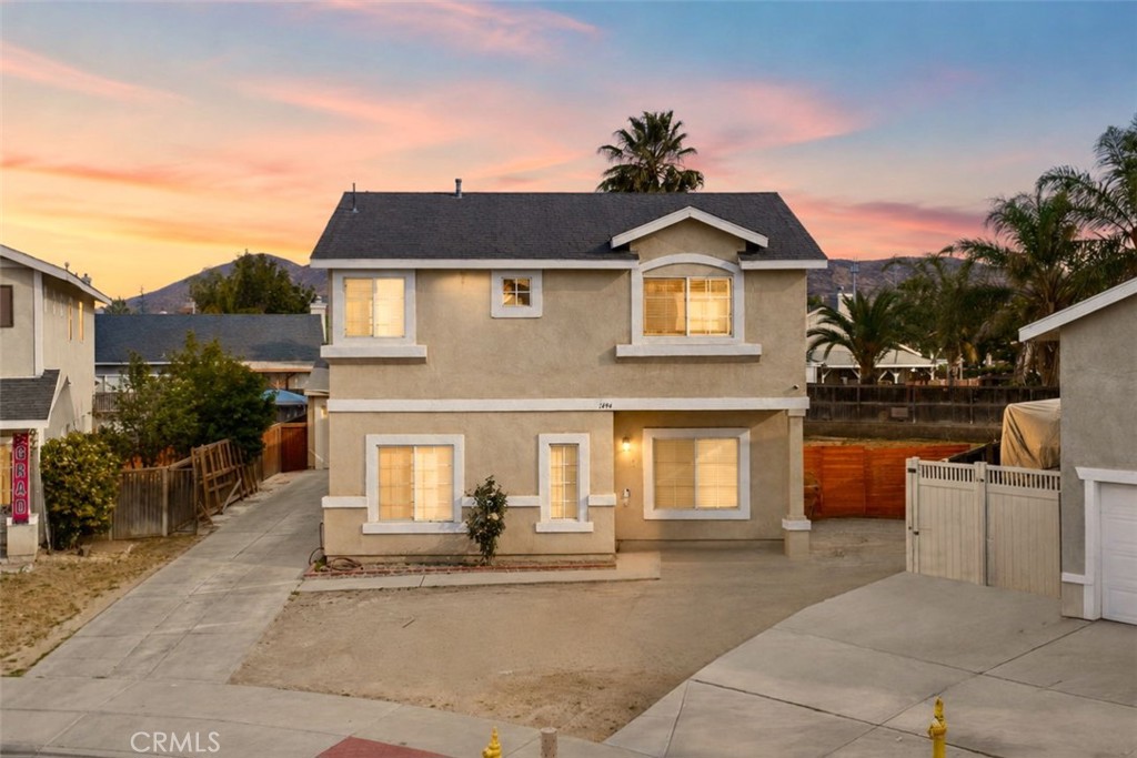 1494 Rabbit Peak Way Hemet, CA 92545 - Photo 3 of 45 a front view of a house with a garage