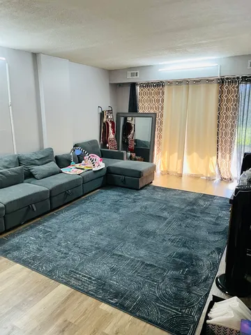 a living room with furniture and a couch