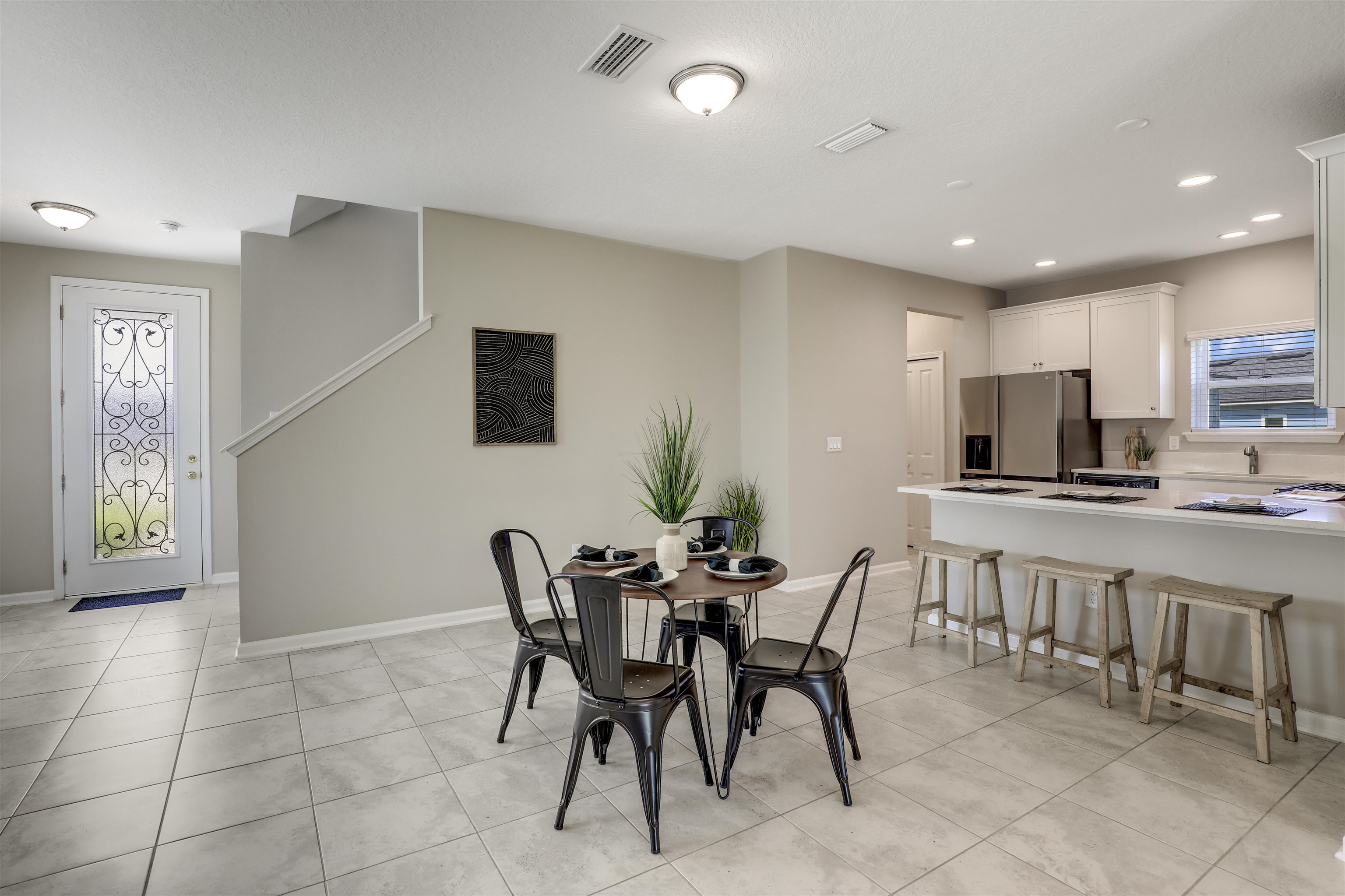 333 Bermudez Way St. Augustine, FL 32095 - Photo 11 of 62 a view of a dining room with furniture