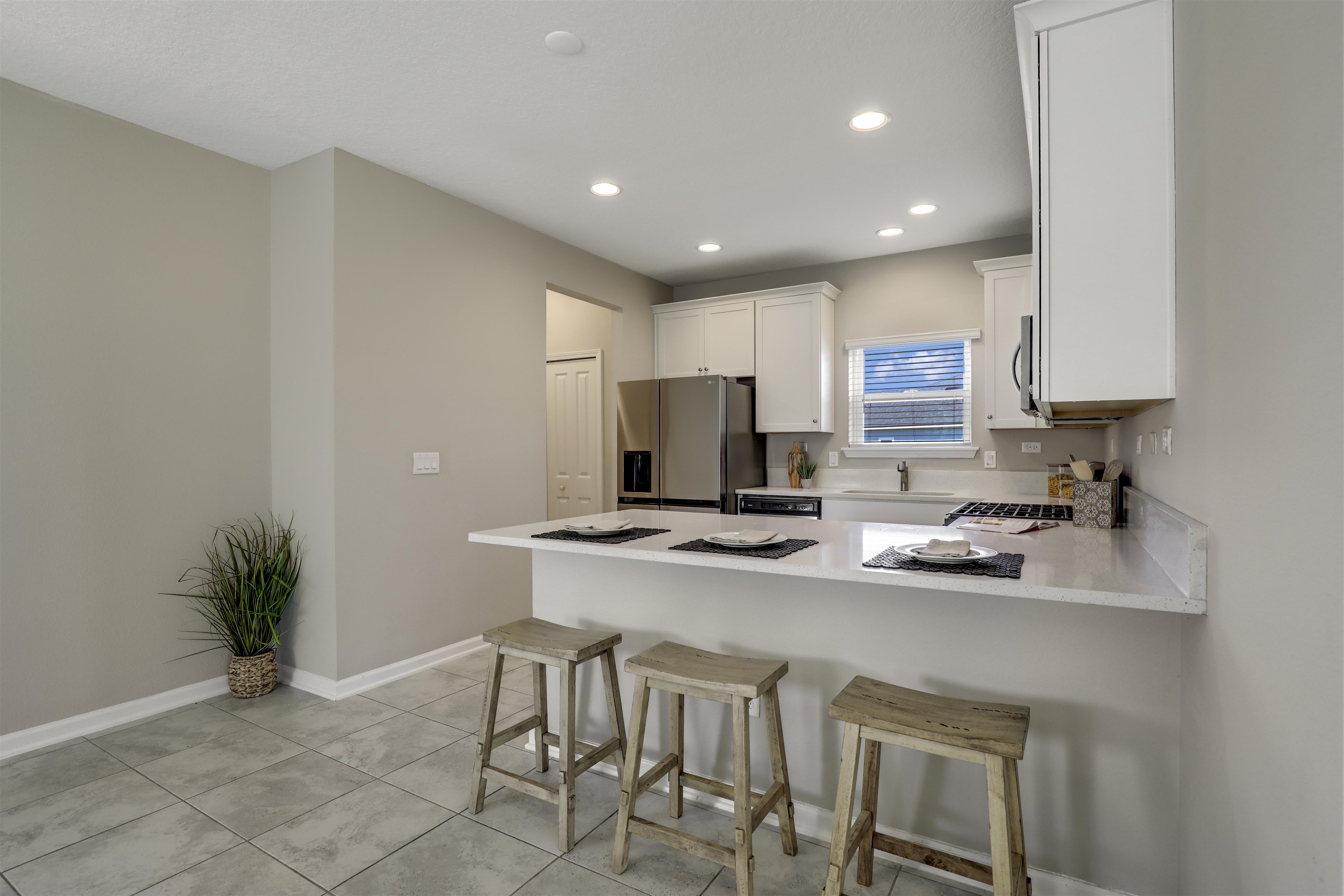 333 Bermudez Way St. Augustine, FL 32095 - Photo 13 of 62 a kitchen with a sink cabinets and chair
