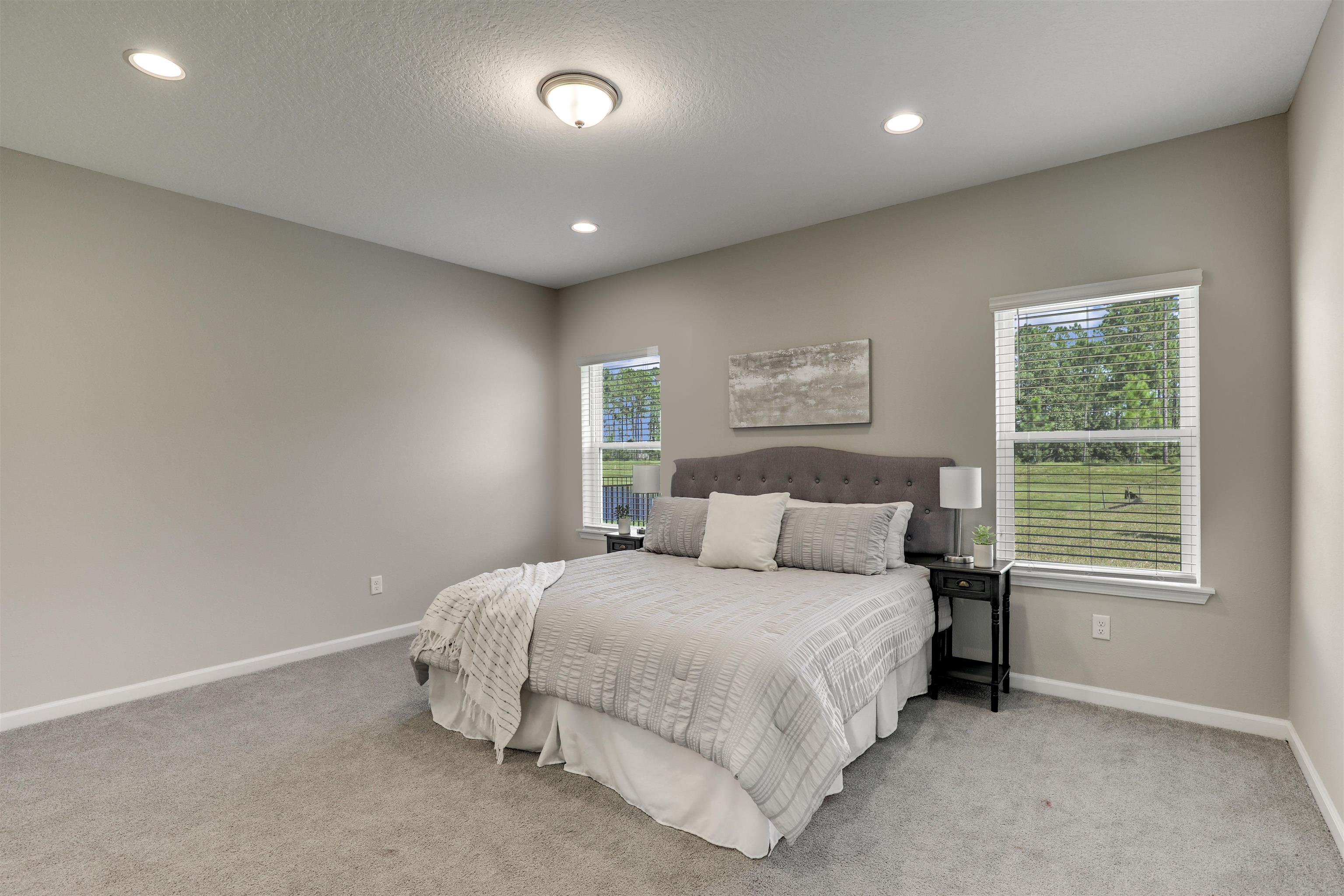 333 Bermudez Way St. Augustine, FL 32095 - Photo 22 of 62 a bedroom with a bed and a window