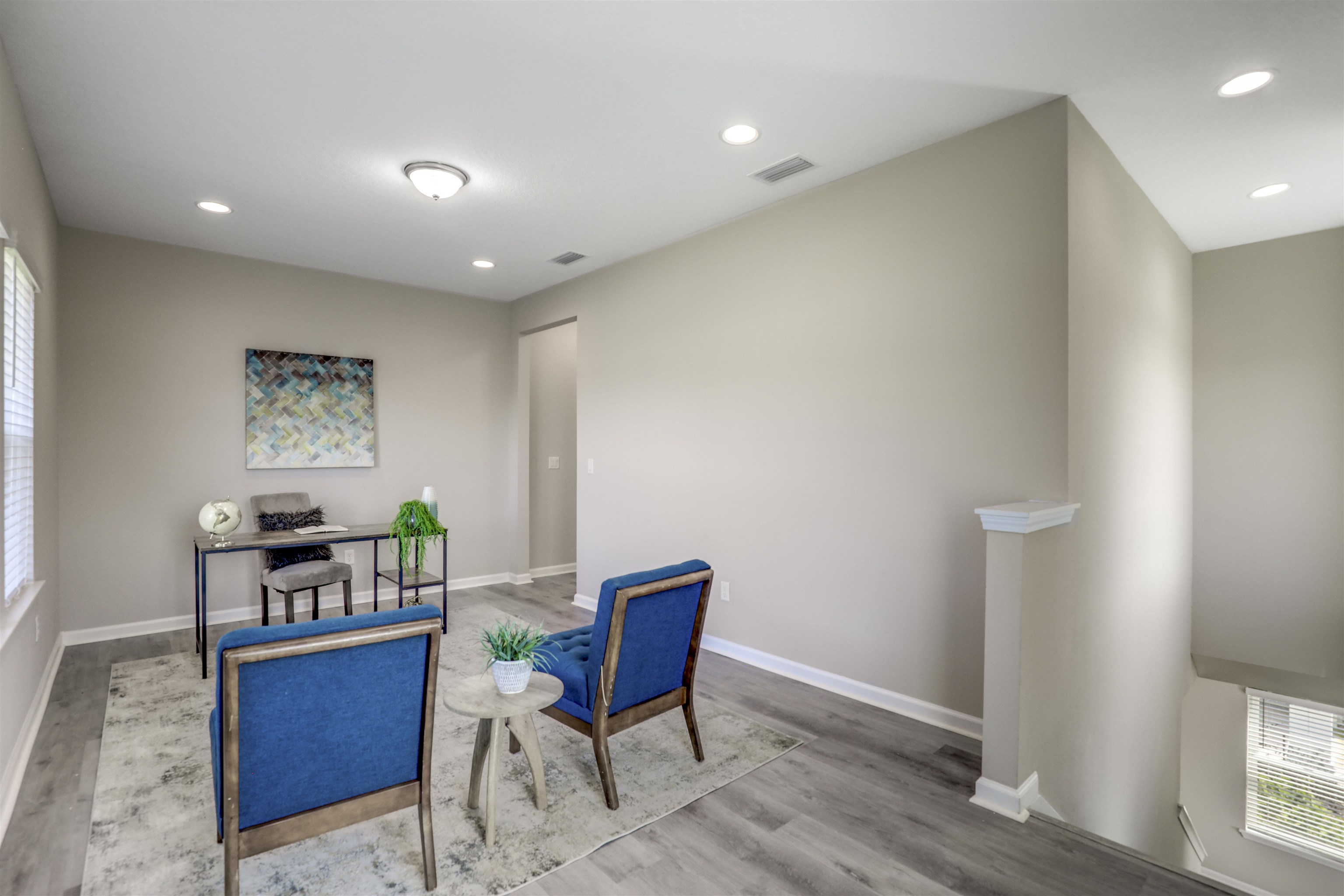333 Bermudez Way St. Augustine, FL 32095 - Photo 27 of 62 a living room with furniture and a wooden floor