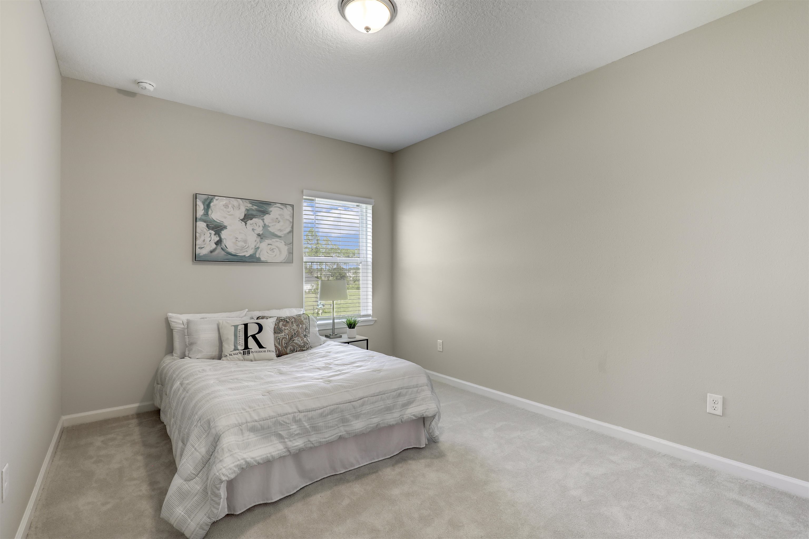 333 Bermudez Way St. Augustine, FL 32095 - Photo 29 of 62 a bedroom with a bed and a window