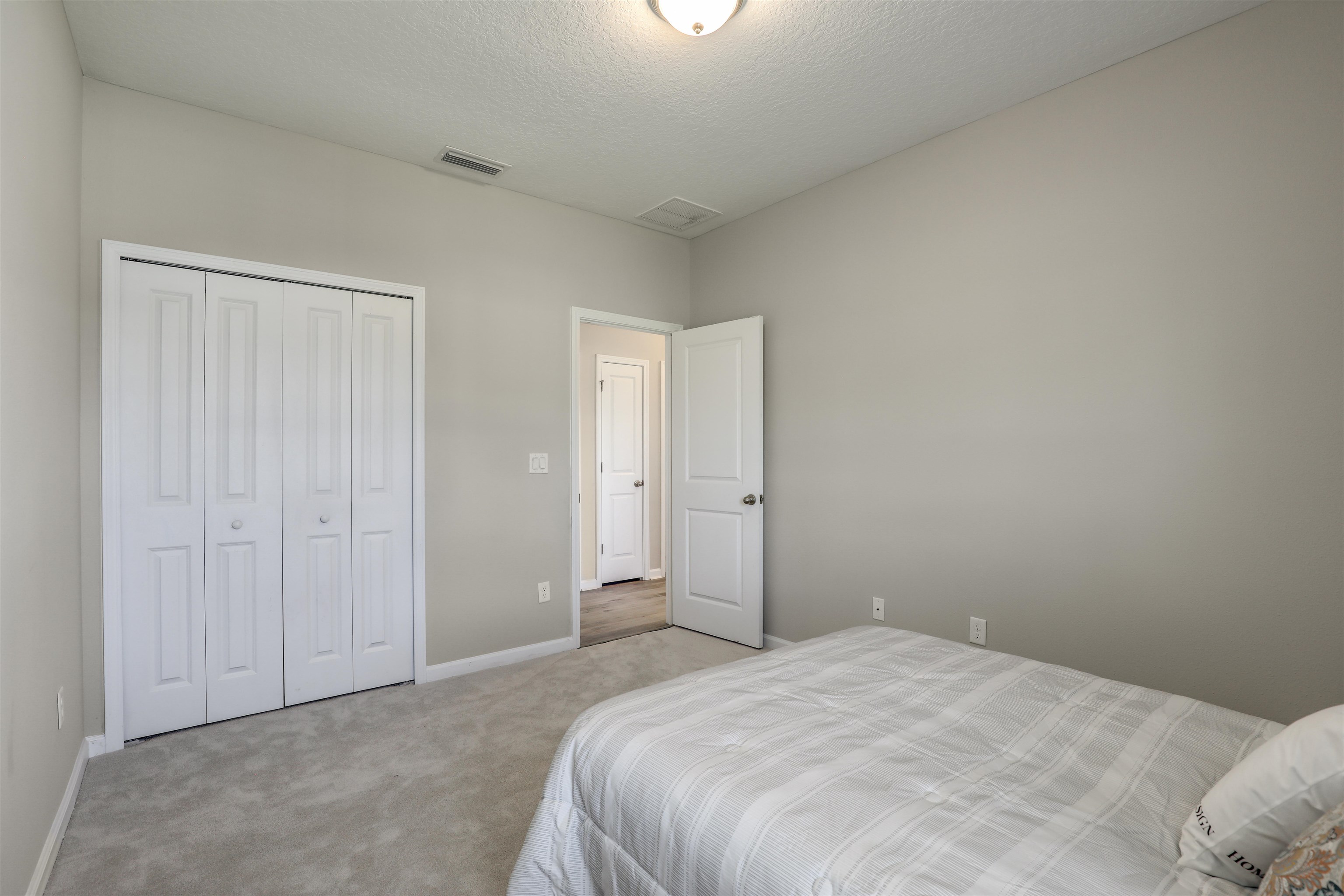 333 Bermudez Way St. Augustine, FL 32095 - Photo 30 of 62 a bedroom with a bed and a window