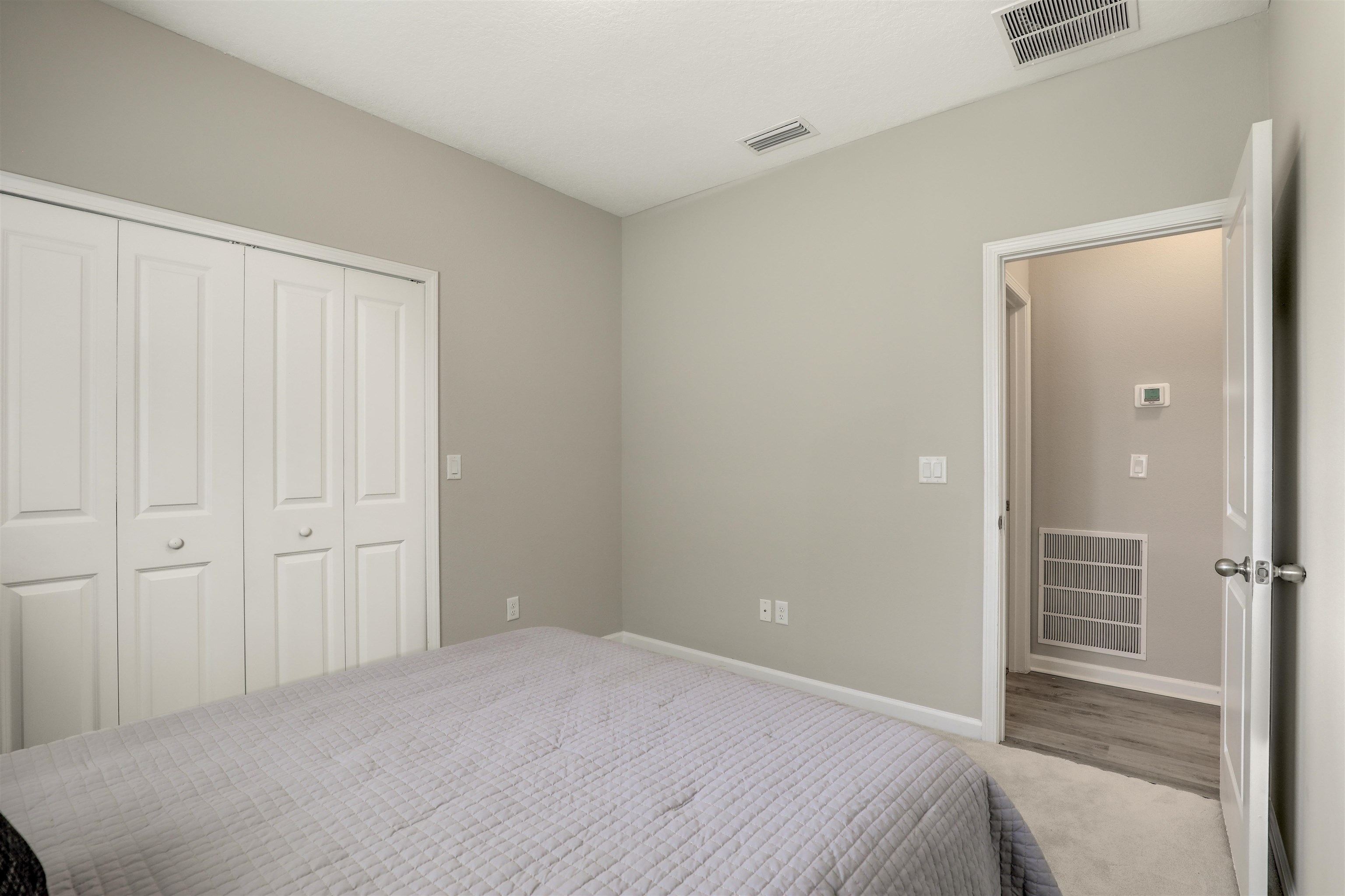 333 Bermudez Way St. Augustine, FL 32095 - Photo 35 of 62 a bedroom with a bed and a window