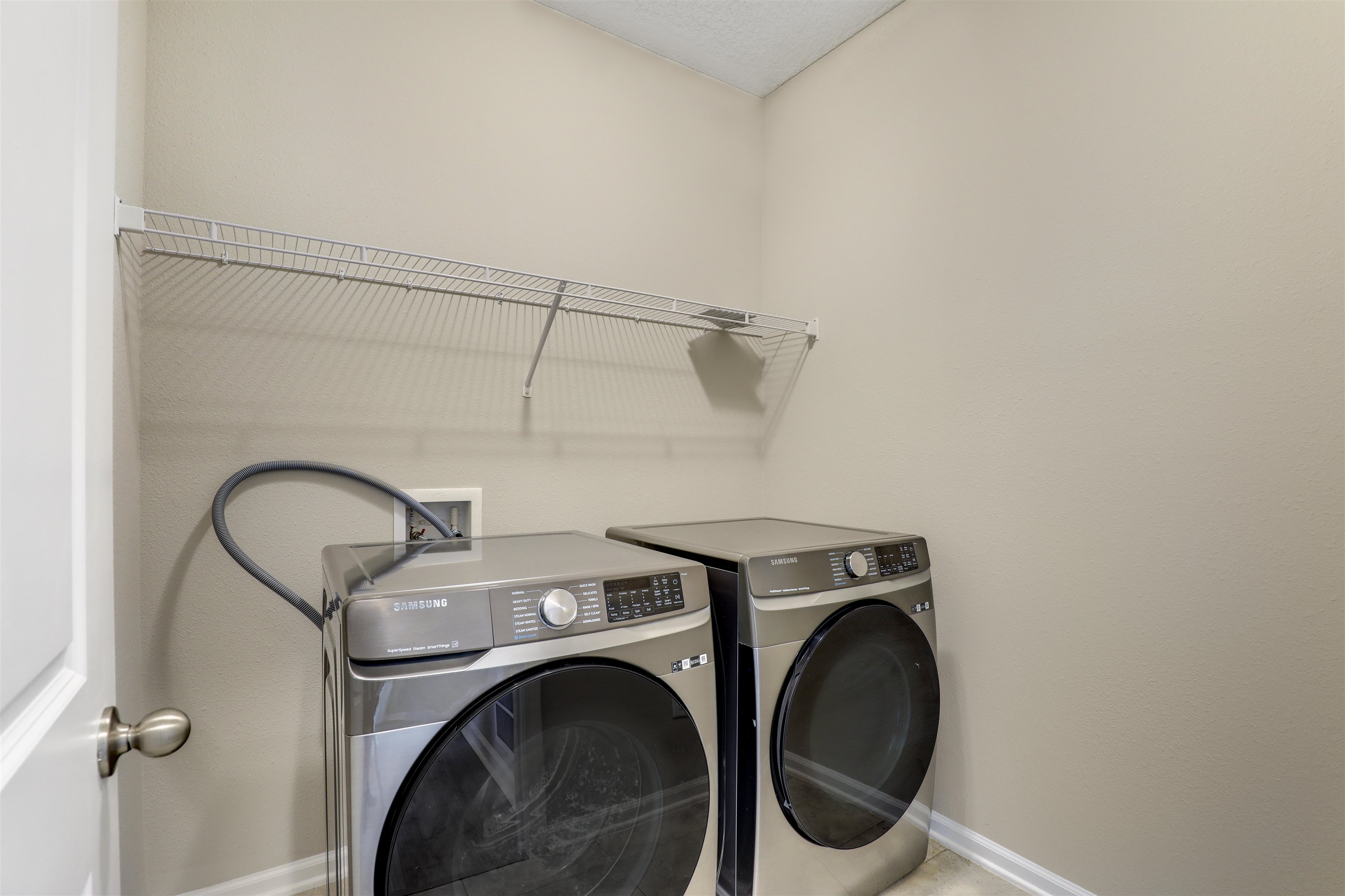 333 Bermudez Way St. Augustine, FL 32095 - Photo 36 of 62 a utility room with dryer and washer