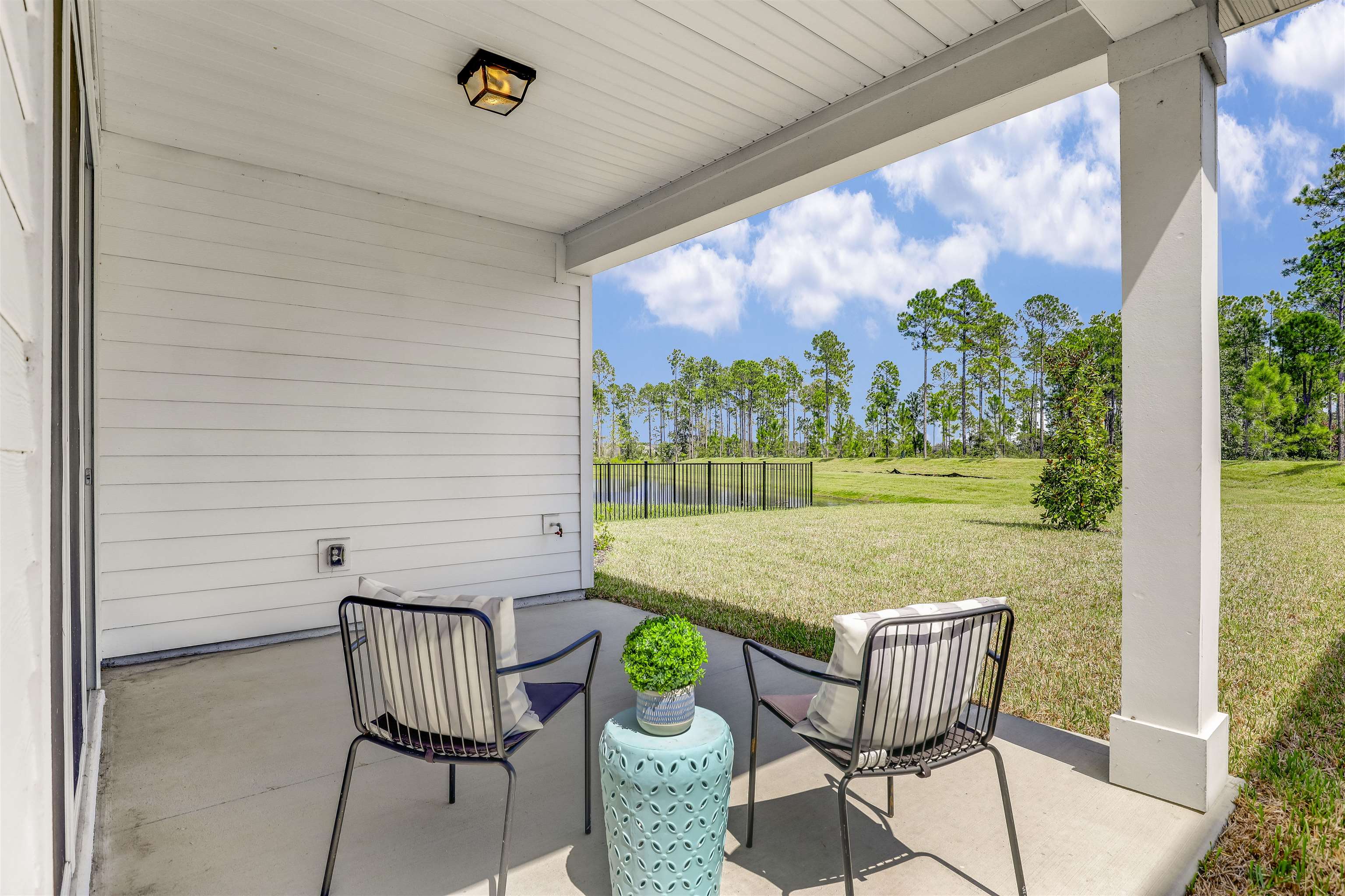 333 Bermudez Way St. Augustine, FL 32095 - Photo 38 of 62 a view of an outdoor sitting area with furniture and garden view