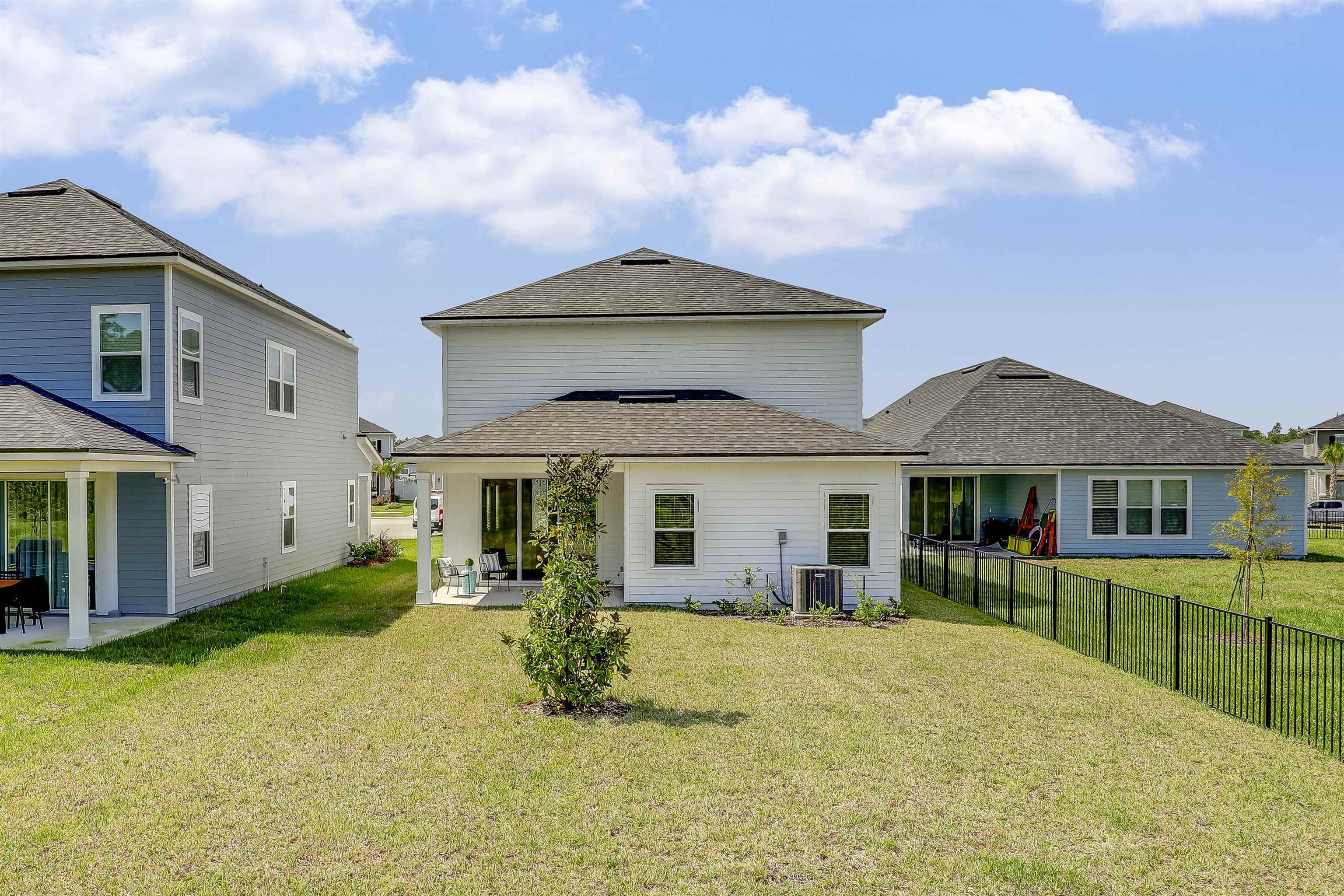 333 Bermudez Way St. Augustine, FL 32095 - Photo 42 of 62 a front view of a house with a yard