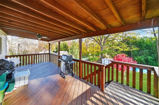 a view of a two chairs in the deck