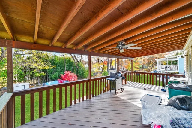 a view of a two chairs in the deck