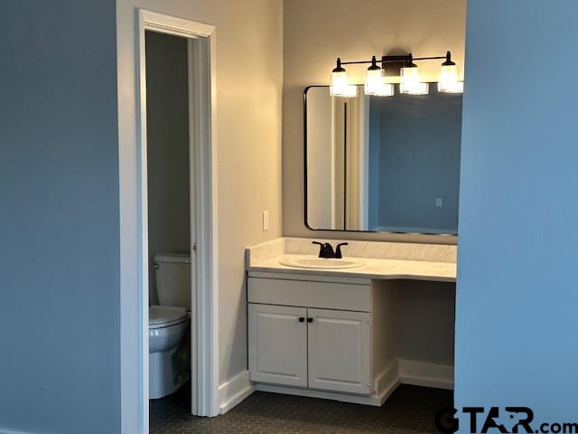 3206 Bain Place Tyler, TX 75701 - Photo 15 of 18 a bathroom with a double vanity sink and mirror
