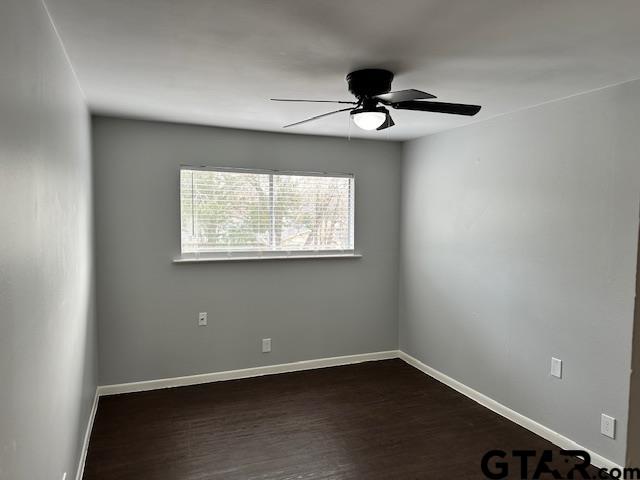 3206 Bain Place Tyler, TX 75701 - Photo 10 of 18 an empty room with a window and ceiling fan
