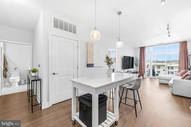 a view of a kitchen and dining room