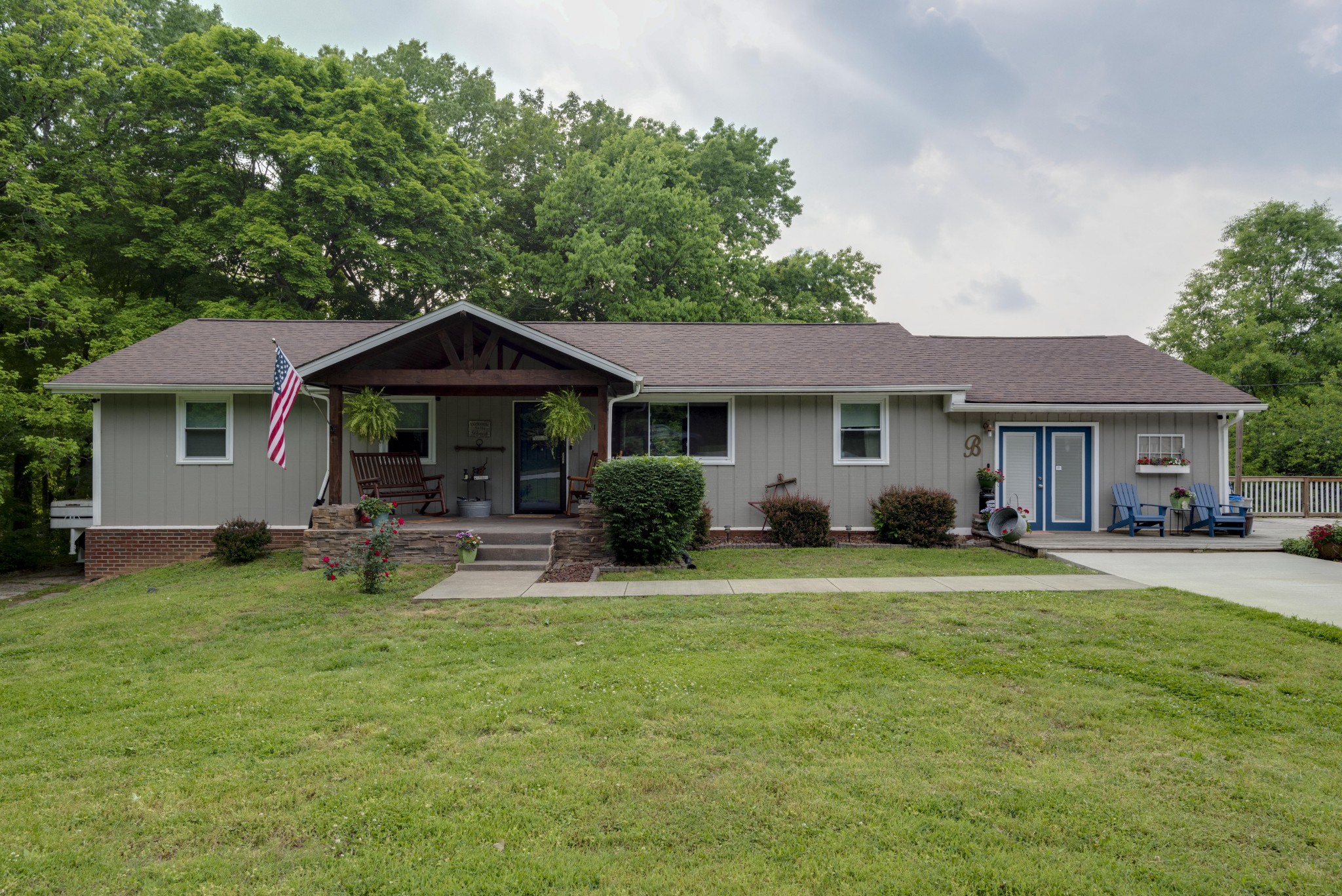 351 Dean Road Clarksville, TN 37040 - Photo 1 of 39 a front view of a house with swimming pool and porch