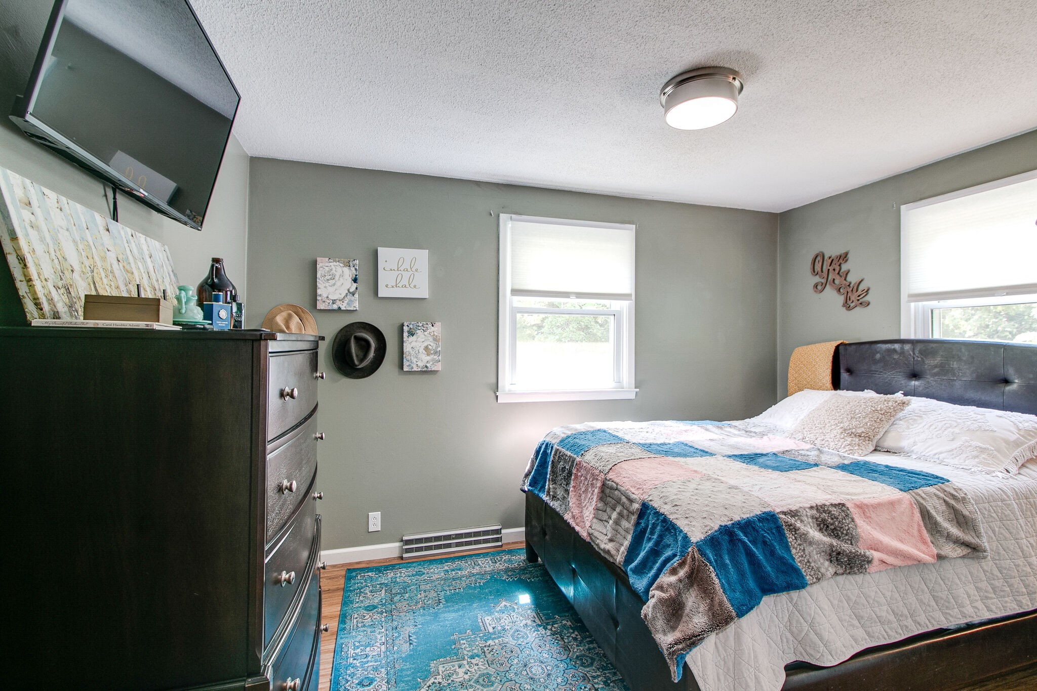 351 Dean Road Clarksville, TN 37040 - Photo 28 of 39 a bedroom with a bed and a flat tv screen on the dresser