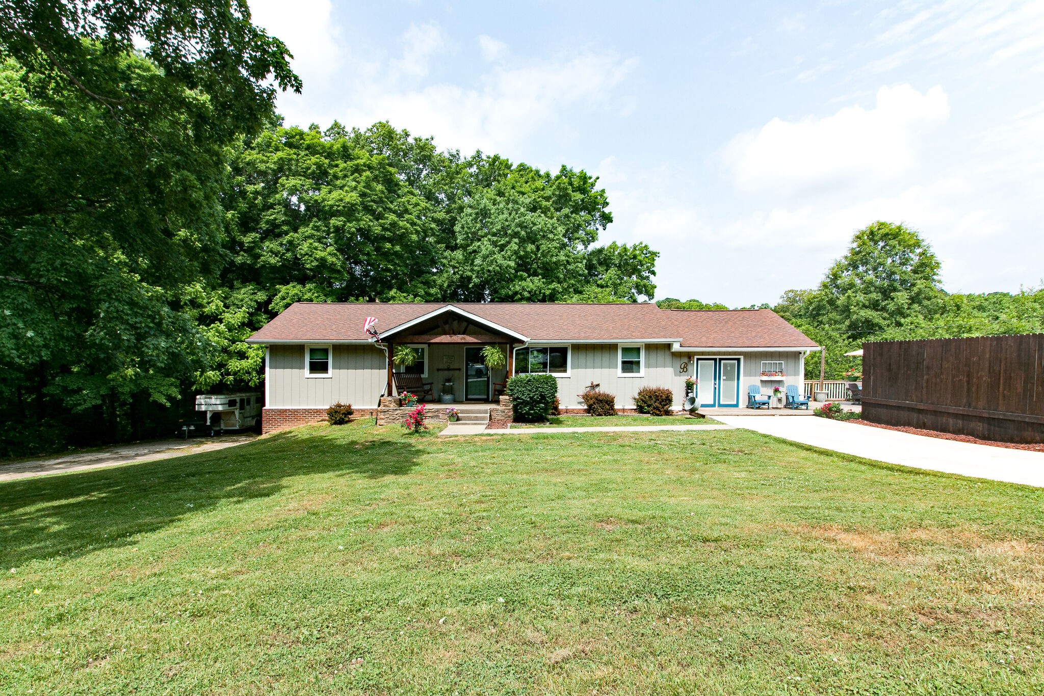 351 Dean Road Clarksville, TN 37040 - Photo 4 of 39 a view of a house with a big yard and large trees