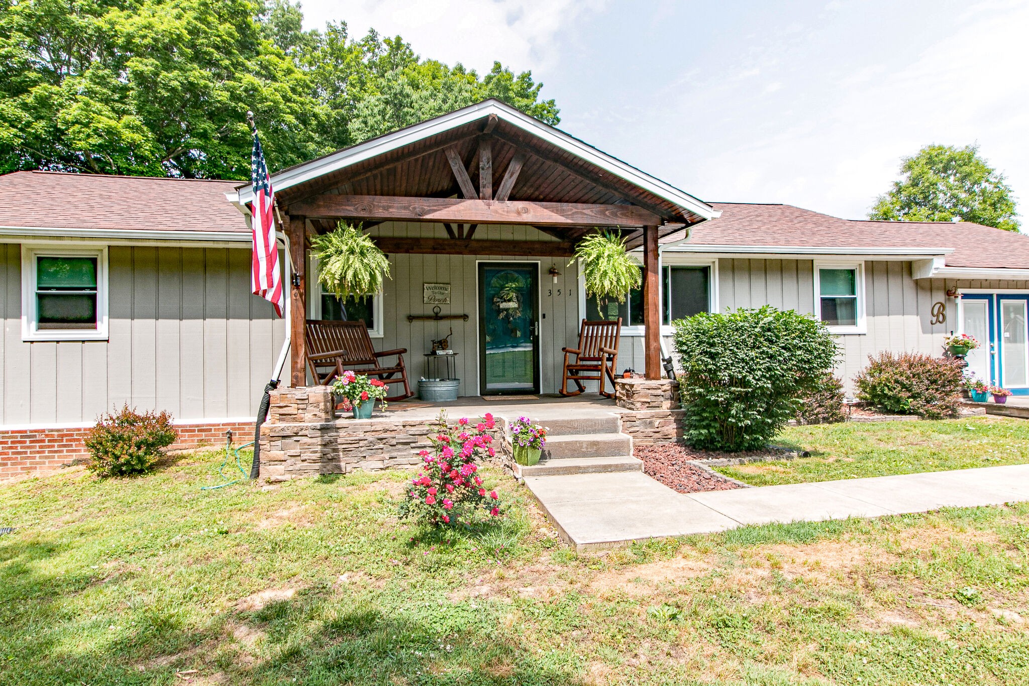 351 Dean Road Clarksville, TN 37040 - Photo 6 of 39 a front view of a house with garden