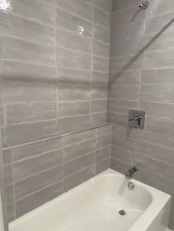 a bathroom with a bathtub